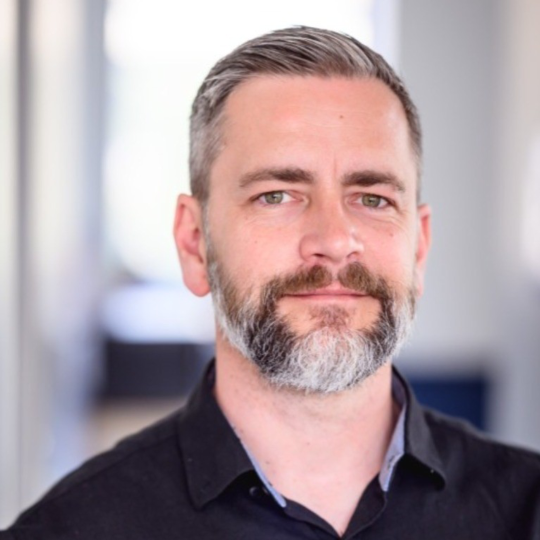 Headshot of Dean MacIsaac