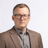 Headshot of Adam Walsh